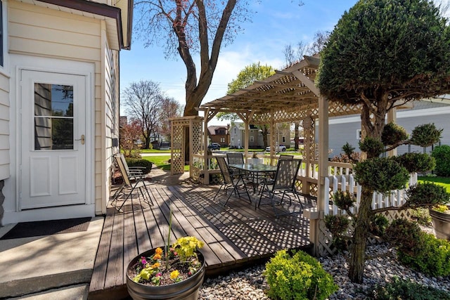 61 N Grand St, Markesan, WI 53946 - wooden terrace with a pergola and outdoor dining area