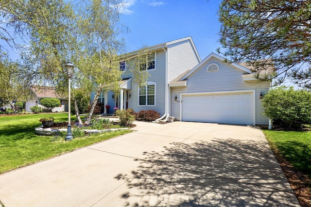 view of front facade featuring driveway, a garage, and a front yard