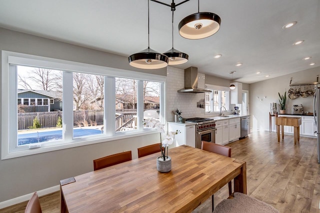 5402 Comanche Way, Madison, WI 53704 - dining area with recessed lighting, light wood finished floors, and baseboards