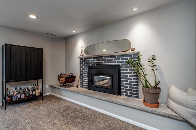 5402 Comanche Way, Madison, WI 53704 - carpeted living area featuring a fireplace, recessed lighting, and baseboards
