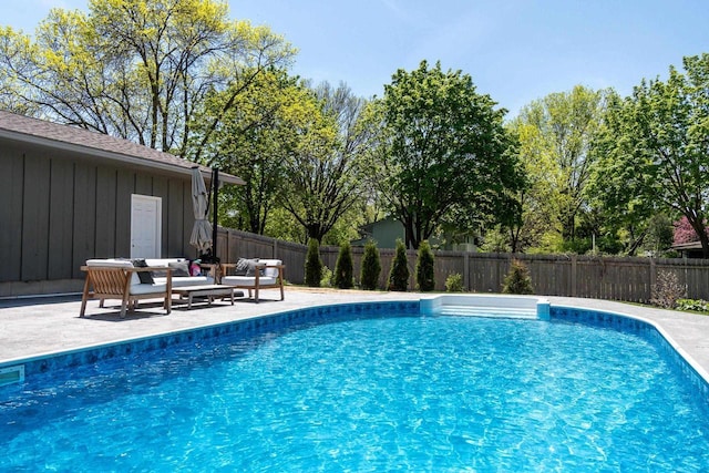5402 Comanche Way, Madison, WI 53704 - view of swimming pool with a fenced backyard, an outdoor living space, and a patio area