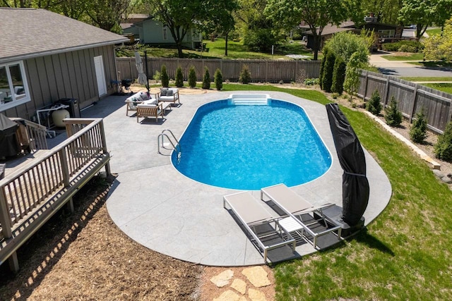 5402 Comanche Way, Madison, WI 53704 - view of swimming pool featuring a patio, a fenced backyard, and an outdoor living space