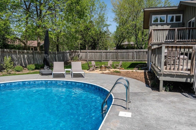 5402 Comanche Way, Madison, WI 53704 - view of pool with a fenced backyard, a patio area, and a wooden deck