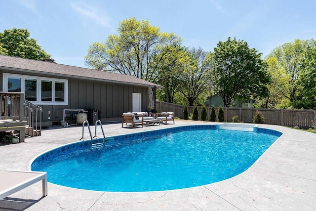 5402 Comanche Way, Madison, WI 53704 - view of swimming pool featuring a patio, fence, and an outdoor living space