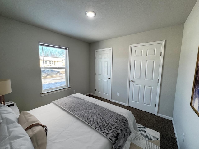 708 E Maple Beach Dr, Edgerton, WI 53534 - bedroom featuring baseboards and carpet floors