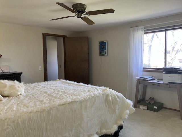 bedroom featuring carpet floors and a ceiling fan