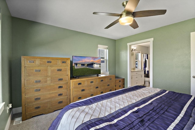 2130 90th St, Sturtevant, WI 53177 - carpeted bedroom featuring ensuite bath and a ceiling fan