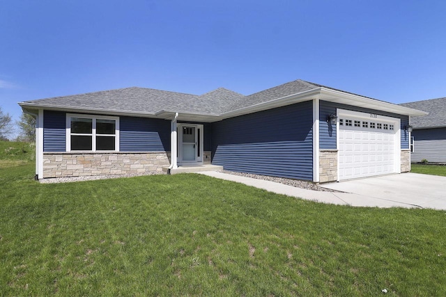 2130 90th St, Sturtevant, WI 53177 - ranch-style home featuring stone siding, an attached garage, a front lawn, driveway, and roof with shingles