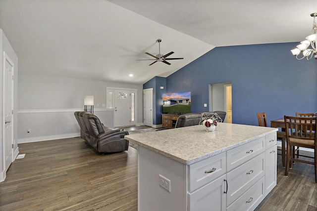 2130 90th St, Sturtevant, WI 53177 - kitchen featuring a chandelier, dark wood-style floors, lofted ceiling, white cabinets, and a ceiling fan
