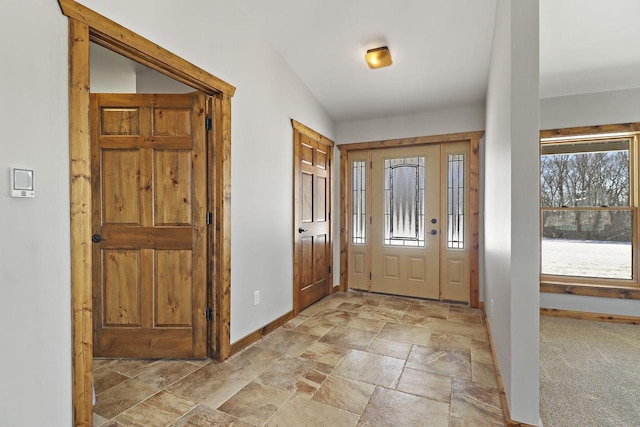 N5911 County Road Dd, Burlington, WI 53105 - entryway featuring baseboards and stone tile flooring