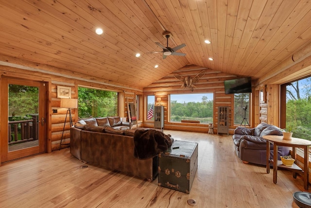 644 County Highway K, Hartford, WI 53027 - living room with wood ceiling, light wood-style flooring, vaulted ceiling, ceiling fan, and rustic walls