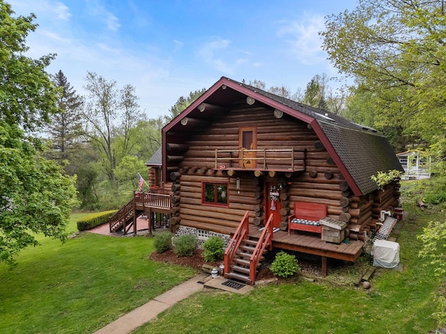 644 County Highway K, Hartford, WI 53027 - rear view of house with stairway, log siding, a lawn, a deck, and a gambrel roof