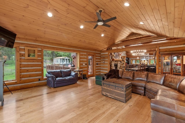 644 County Highway K, Hartford, WI 53027 - living area with rustic walls, wooden ceiling, lofted ceiling, light wood finished floors, and a ceiling fan