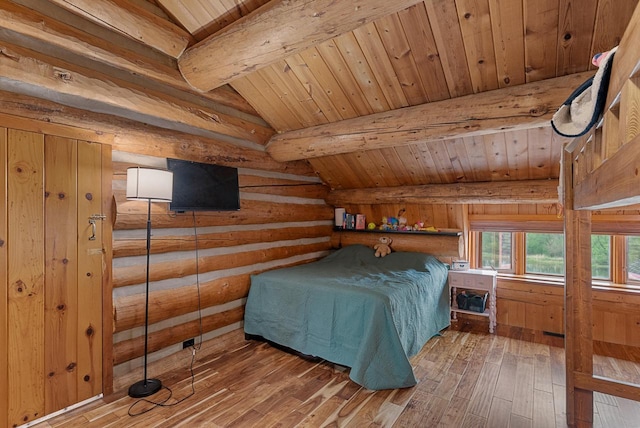 644 County Highway K, Hartford, WI 53027 - bedroom with wooden ceiling, hardwood / wood-style floors, and rustic walls