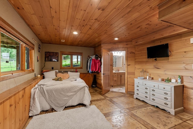 644 County Highway K, Hartford, WI 53027 - bedroom featuring wood ceiling, recessed lighting, wood walls, connected bathroom, and a sink