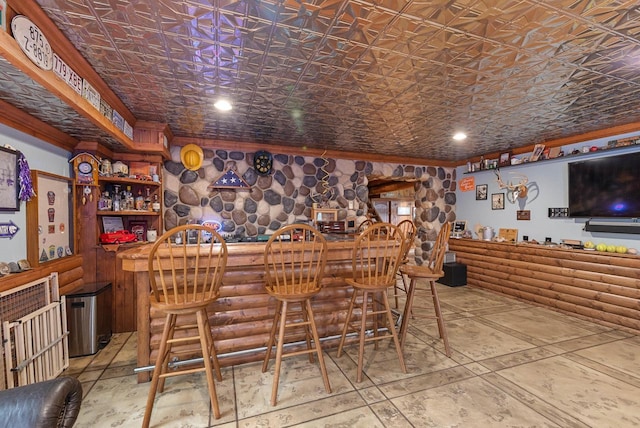 644 County Highway K, Hartford, WI 53027 - indoor bar featuring crown molding, an ornate ceiling, and log walls