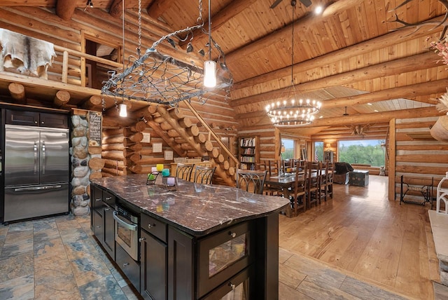 644 County Highway K, Hartford, WI 53027 - kitchen featuring appliances with stainless steel finishes, log walls, wood ceiling, a chandelier, and pendant lighting
