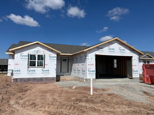 2070 Red Fox Ln, Kaukauna, WI 54130 - property under construction with a garage and driveway