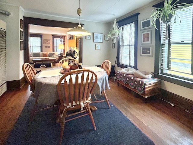 918 E Center St Unit 920, 922, Milwaukee, WI 53212 - dining space with wood finished floors, ornamental molding, and healthy amount of natural light