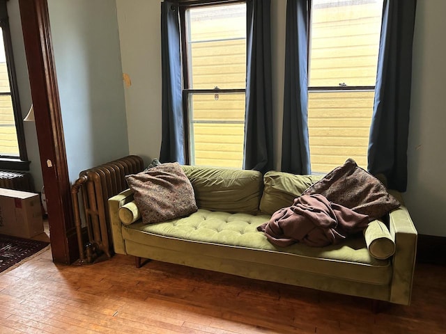 918 E Center St Unit 920, 922, Milwaukee, WI 53212 - sitting room featuring hardwood / wood-style flooring and radiator heating unit