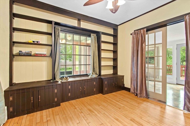 330 1st St, Port Edwards, WI 54469 - unfurnished office with wood-type flooring, plenty of natural light, and a ceiling fan