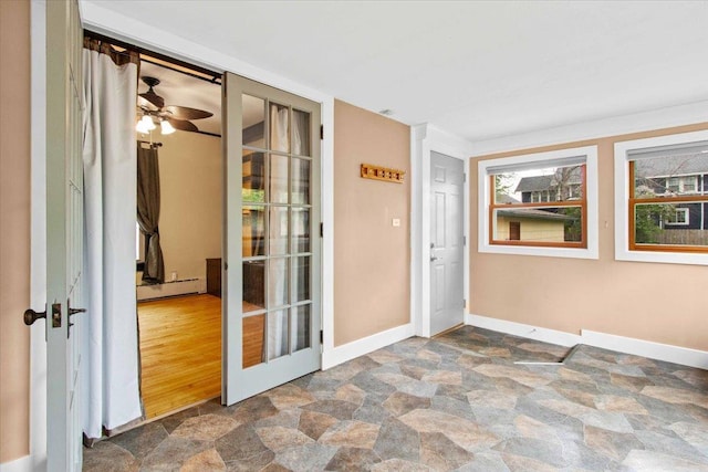 330 1st St, Port Edwards, WI 54469 - unfurnished sunroom featuring a baseboard radiator