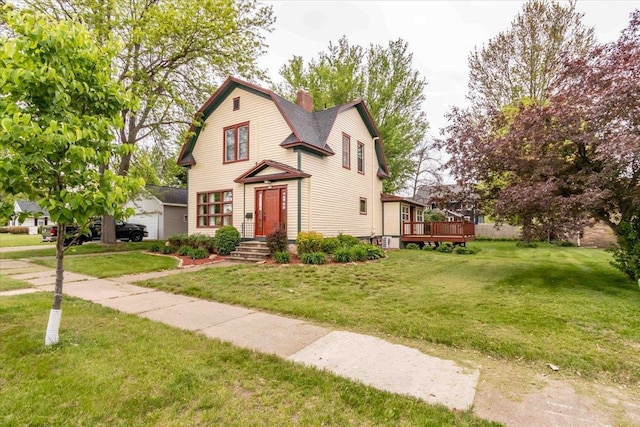 330 1st St, Port Edwards, WI 54469 - dutch colonial featuring a gambrel roof, a chimney, a front yard, and a wooden deck