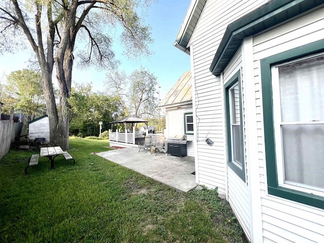 view of yard with a gazebo and a patio area