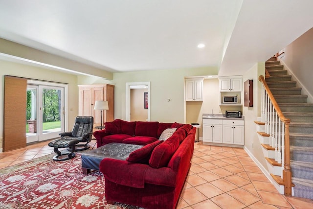 W8849 Deer Run Trl, Cambridge, WI 53523 - living room featuring light tile patterned flooring, stairway, and recessed lighting