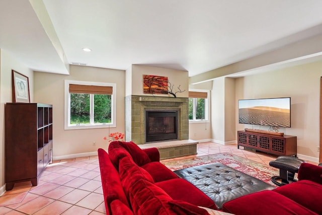 W8849 Deer Run Trl, Cambridge, WI 53523 - tiled living area with a fireplace, baseboards, and recessed lighting