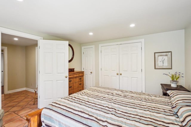 W8849 Deer Run Trl, Cambridge, WI 53523 - bedroom featuring recessed lighting, a closet, light tile patterned floors, and baseboards