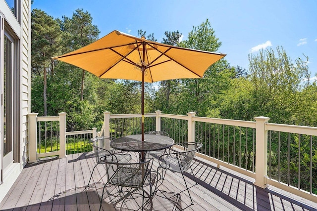 W8849 Deer Run Trl, Cambridge, WI 53523 - wooden terrace with outdoor dining area