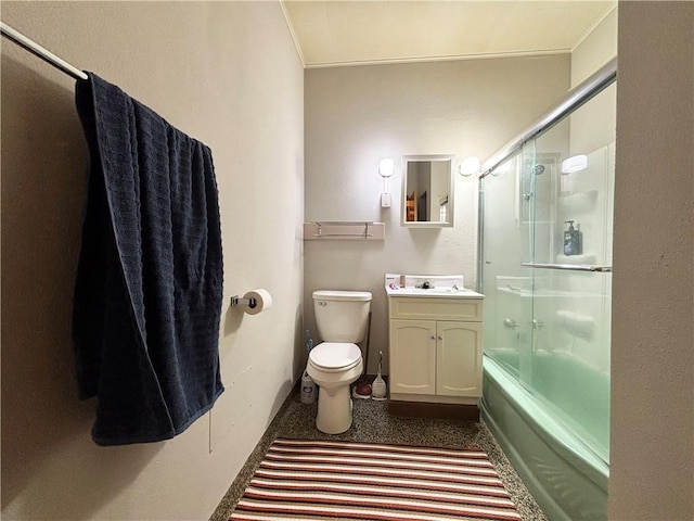 111 Arlington Ave Unit 1-12, Cameron, WI 54822 - bathroom with toilet, vanity, combined bath / shower with glass door, and baseboards
