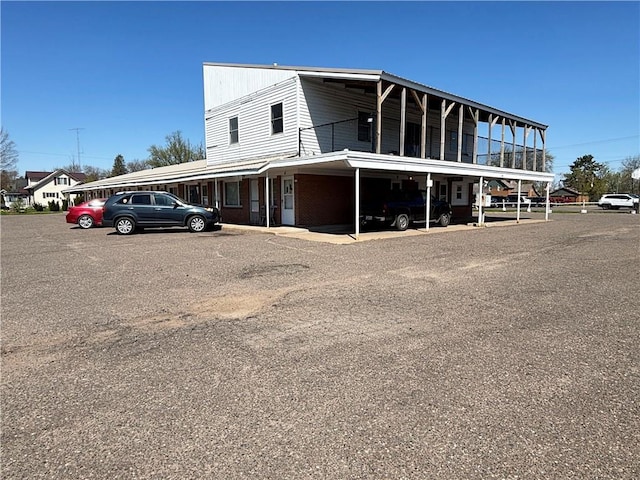 111 Arlington Ave Unit 1-12, Cameron, WI 54822 - view of front of home featuring uncovered parking