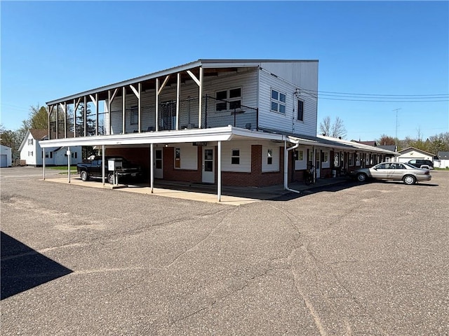 111 Arlington Ave Unit 1-12, Cameron, WI 54822 - view of front facade featuring brick siding