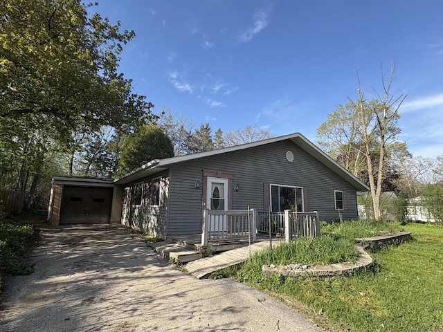 13010 W Honey Ln, New Berlin, WI 53151 - view of front of property with asphalt driveway and a garage