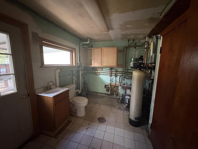 13010 W Honey Ln, New Berlin, WI 53151 - full bath featuring toilet, vanity, tile patterned floors, and walk in shower