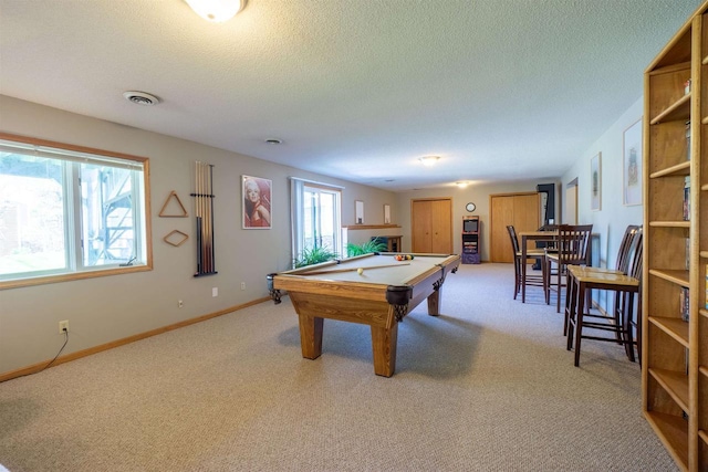 1502 Marquardt Rd, Wausau, WI 54403 - recreation room with light carpet, pool table, a textured ceiling, and baseboards