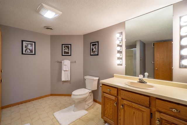 1502 Marquardt Rd, Wausau, WI 54403 - full bath with a textured ceiling, a shower stall, toilet, baseboards, and vanity
