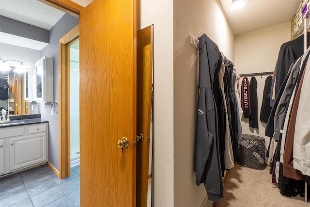 1502 Marquardt Rd, Wausau, WI 54403 - spacious closet featuring a sink and light tile patterned flooring