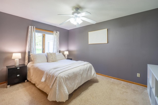 1502 Marquardt Rd, Wausau, WI 54403 - bedroom featuring baseboards, light colored carpet, and ceiling fan