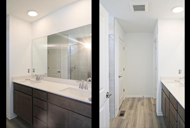 4004 Banbury St, Windsor, WI 53598 - bathroom featuring double vanity, wood finished floors, a stall shower, and baseboards