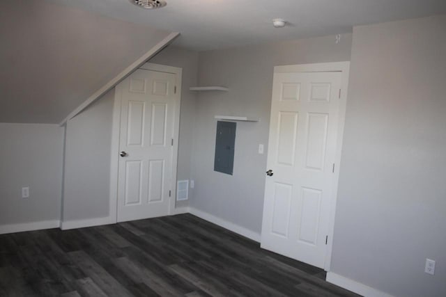 2909 N Farwell Ave, Milwaukee, WI 53211 - additional living space with electric panel, baseboards, and dark wood finished floors