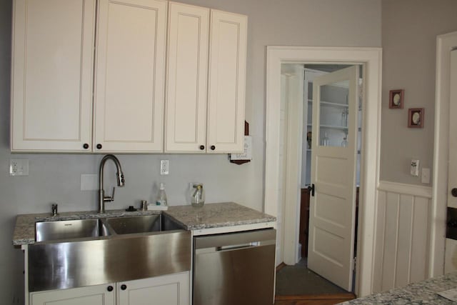 2909 N Farwell Ave, Milwaukee, WI 53211 - kitchen featuring dishwasher, a sink, white cabinetry, and light stone counters