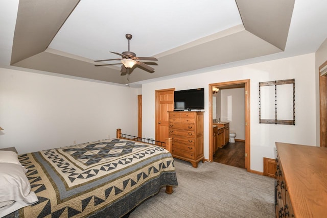 6454 Heritage Ave, Mount Pleasant, WI 53406 - carpeted bedroom with a raised ceiling, ceiling fan, and baseboards