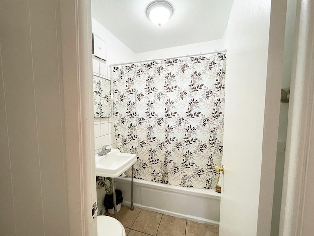 91 Oakwood St, Williams Bay, WI 53191 - bathroom featuring tile patterned flooring, shower / bath combo with shower curtain, and toilet