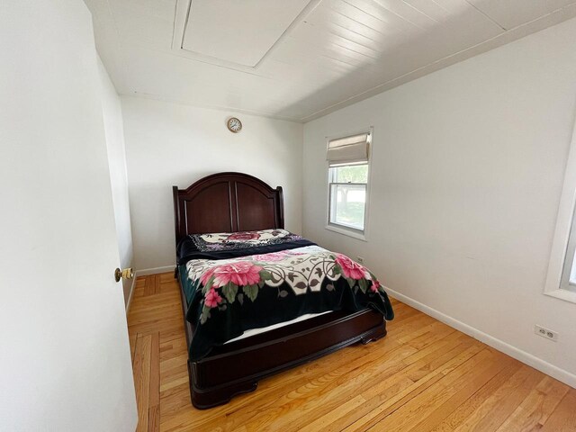 91 Oakwood St, Williams Bay, WI 53191 - bedroom featuring baseboards and light wood-style floors