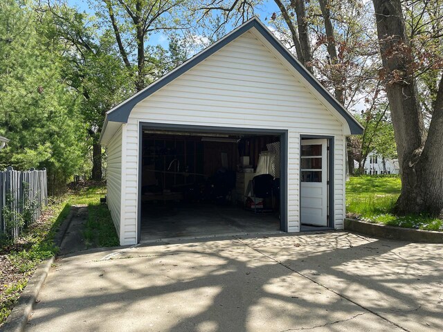 91 Oakwood St, Williams Bay, WI 53191 - detached garage featuring fence