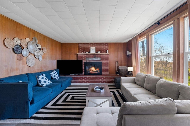 229 Bay Rd, Peshtigo, WI 54147 - living area with wooden walls and a brick fireplace