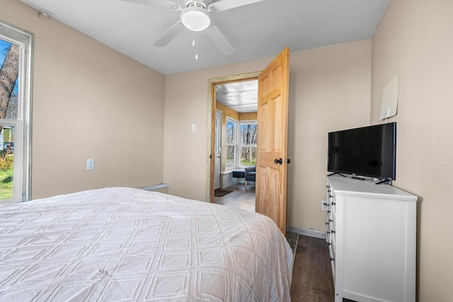 229 Bay Rd, Peshtigo, WI 54147 - bedroom with wood finished floors, ceiling fan, and baseboards